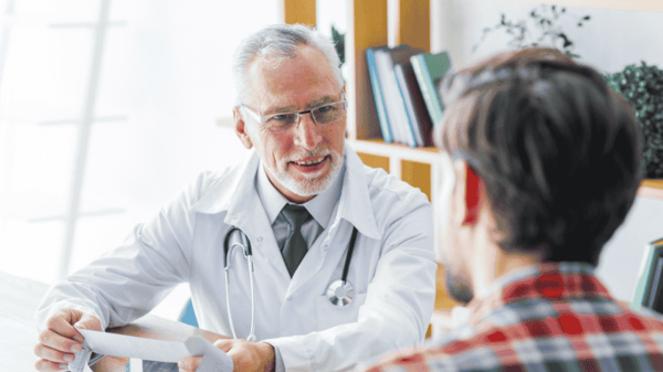 Doctor-smiling-to-patient