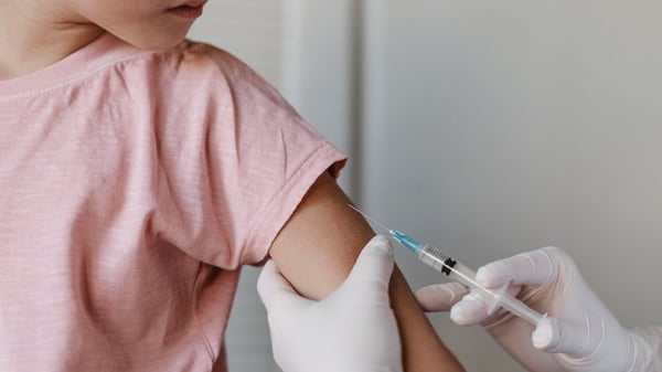 Doctor administering vaccine