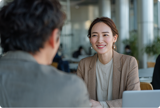 women talking to man