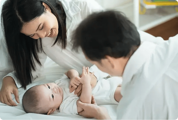 a pair of parents and their young child